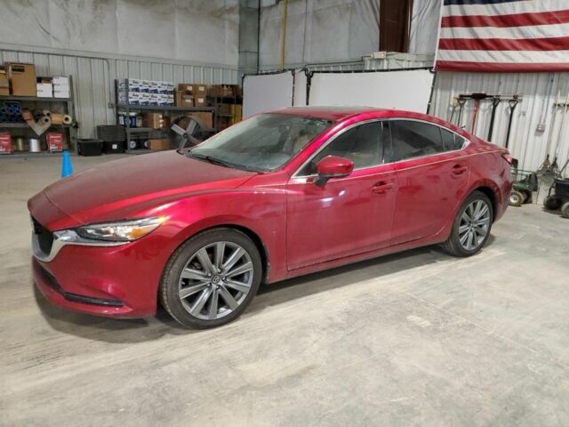 Красный Мазда 6, объемом двигателя 2.5 л и пробегом 125 тыс. км за 11700 $, фото 1 на Automoto.ua