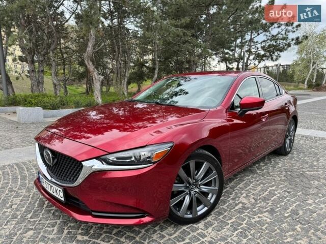Красный Мазда 6, объемом двигателя 2.49 л и пробегом 123 тыс. км за 16999 $, фото 1 на Automoto.ua