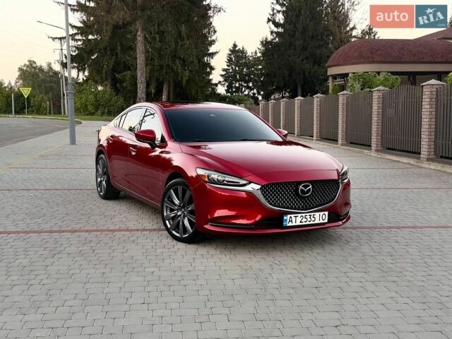 Красный Мазда 6, объемом двигателя 2.49 л и пробегом 82 тыс. км за 16900 $, фото 1 на Automoto.ua