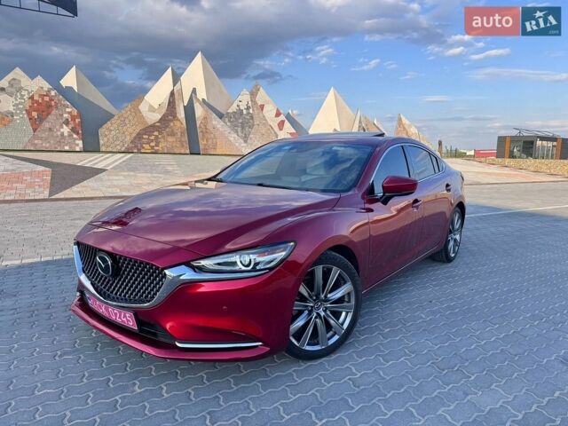 Красный Мазда 6, объемом двигателя 2.49 л и пробегом 50 тыс. км за 19200 $, фото 1 на Automoto.ua