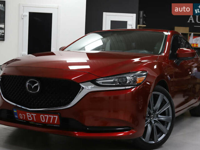 Красный Мазда 6, объемом двигателя 2.49 л и пробегом 70 тыс. км за 16900 $, фото 1 на Automoto.ua