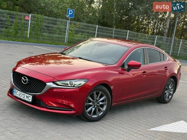 Красный Мазда 6, объемом двигателя 2 л и пробегом 121 тыс. км за 16999 $, фото 1 на Automoto.ua