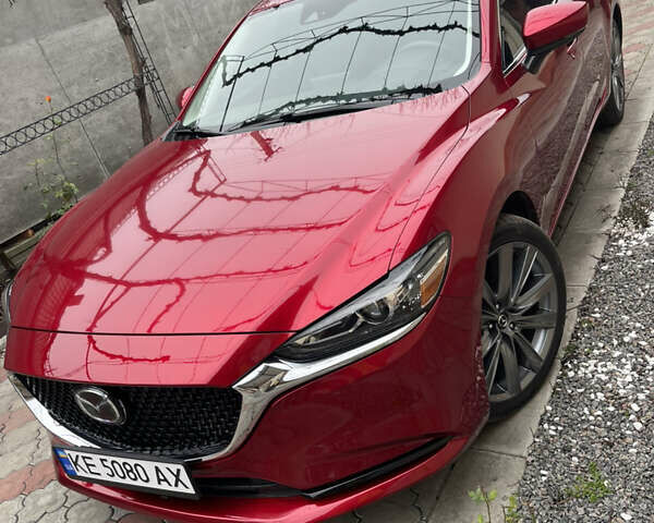 Красный Мазда 6, объемом двигателя 2.49 л и пробегом 73 тыс. км за 19500 $, фото 1 на Automoto.ua