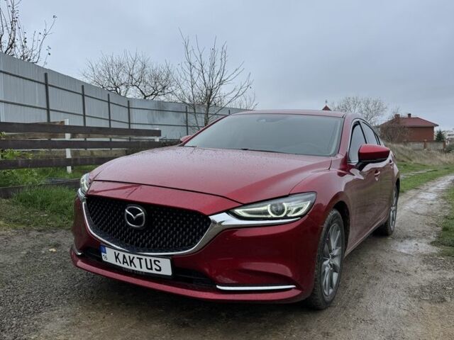 Красный Мазда 6, объемом двигателя 2.5 л и пробегом 77 тыс. км за 15500 $, фото 1 на Automoto.ua