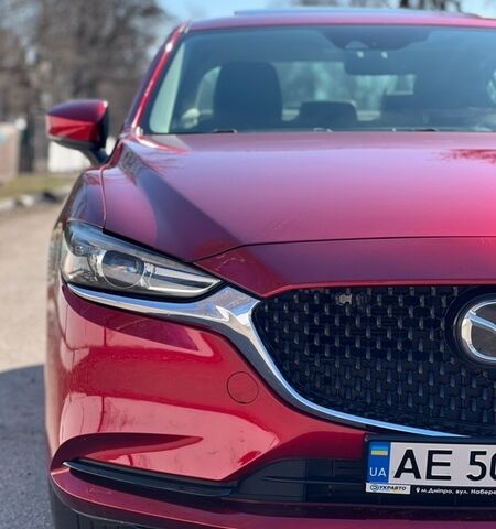 Красный Мазда 6, объемом двигателя 2.5 л и пробегом 56 тыс. км за 16500 $, фото 1 на Automoto.ua