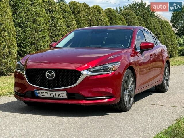 Красный Мазда 6, объемом двигателя 2.49 л и пробегом 97 тыс. км за 16500 $, фото 1 на Automoto.ua