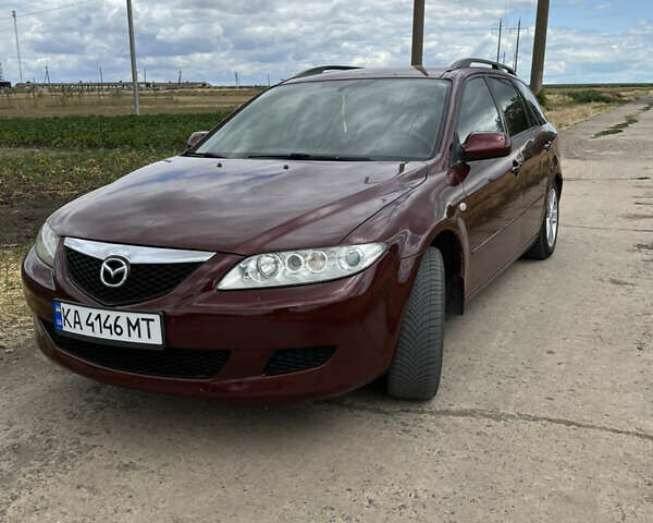 Красный Мазда 6, объемом двигателя 1.8 л и пробегом 328 тыс. км за 3900 $, фото 1 на Automoto.ua