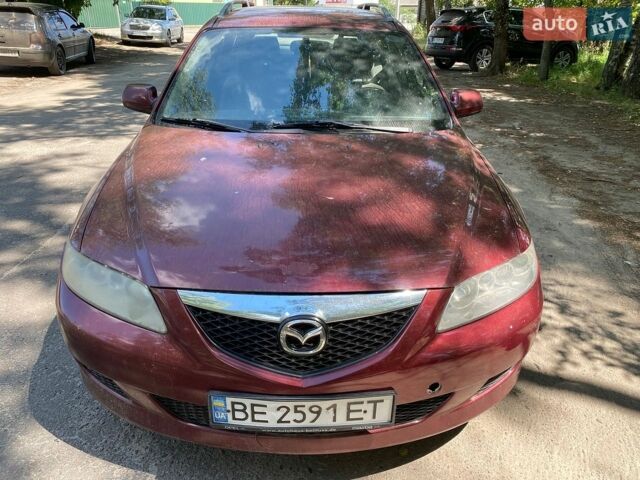 Красный Мазда 6, объемом двигателя 2 л и пробегом 252 тыс. км за 1700 $, фото 1 на Automoto.ua