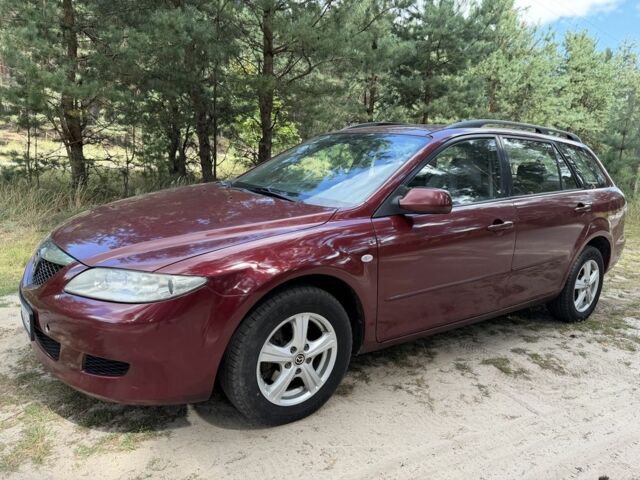 Красный Мазда 6, объемом двигателя 2 л и пробегом 245 тыс. км за 2951 $, фото 1 на Automoto.ua