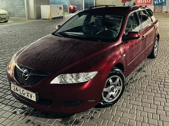 Красный Мазда 6, объемом двигателя 2 л и пробегом 300 тыс. км за 2100 $, фото 1 на Automoto.ua