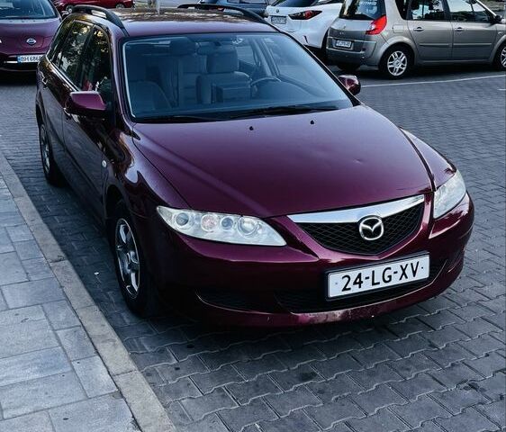 Красный Мазда 6, объемом двигателя 2 л и пробегом 320 тыс. км за 2099 $, фото 1 на Automoto.ua