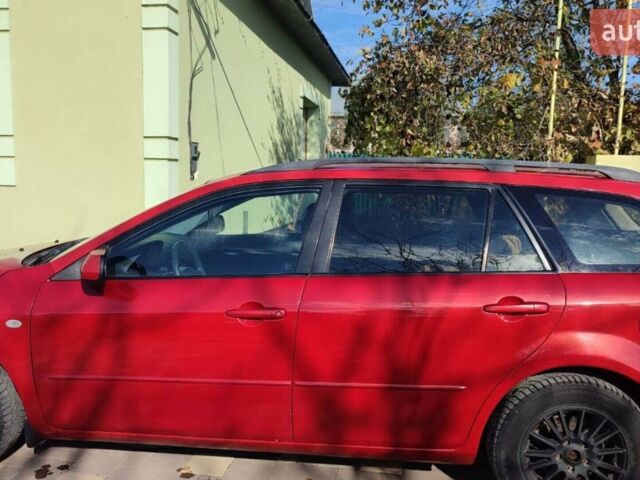 Красный Мазда 6, объемом двигателя 2 л и пробегом 265 тыс. км за 2999 $, фото 1 на Automoto.ua
