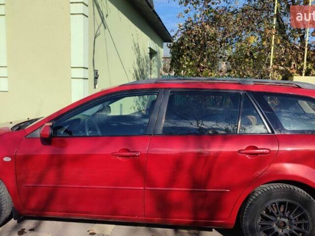 Красный Мазда 6, объемом двигателя 2 л и пробегом 265 тыс. км за 3100 $, фото 1 на Automoto.ua