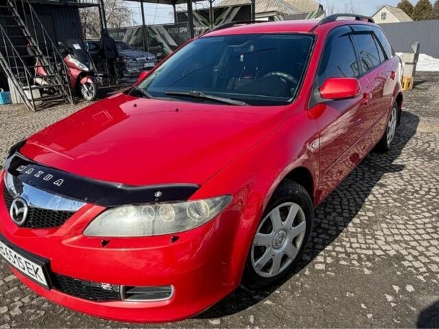 Красный Мазда 6, объемом двигателя 2 л и пробегом 267 тыс. км за 5500 $, фото 1 на Automoto.ua