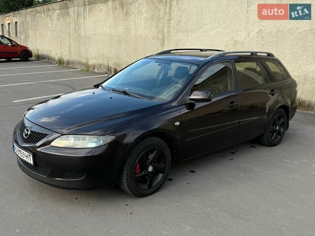 Красный Мазда 6, объемом двигателя 2 л и пробегом 237 тыс. км за 3500 $, фото 1 на Automoto.ua