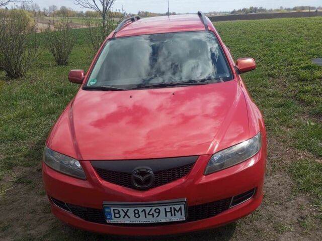 Красный Мазда 6, объемом двигателя 2 л и пробегом 212 тыс. км за 5200 $, фото 1 на Automoto.ua