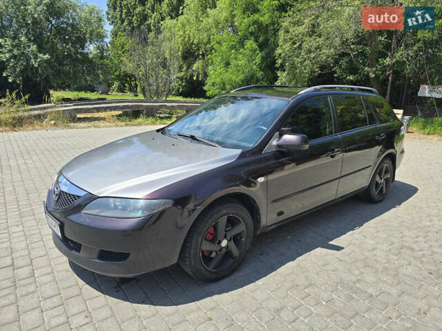 Красный Мазда 6, объемом двигателя 2 л и пробегом 237 тыс. км за 4400 $, фото 1 на Automoto.ua