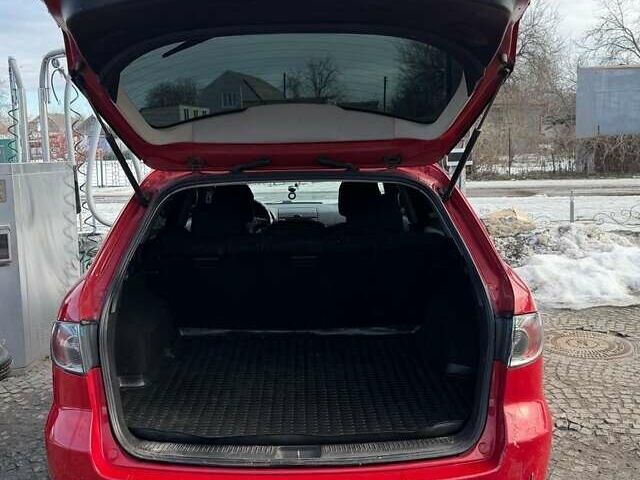 Красный Мазда 6, объемом двигателя 2 л и пробегом 267 тыс. км за 5500 $, фото 1 на Automoto.ua