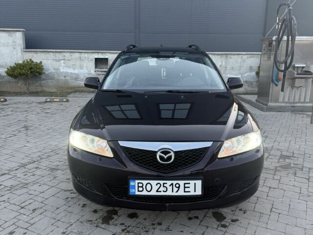 Красный Мазда 6, объемом двигателя 2 л и пробегом 190 тыс. км за 4000 $, фото 1 на Automoto.ua