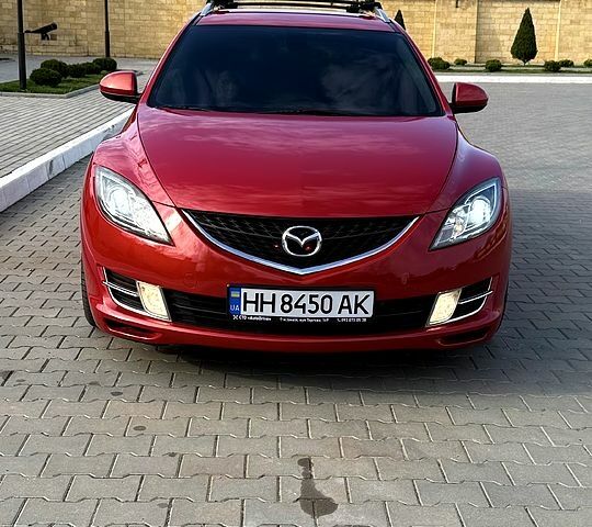 Красный Мазда 6, объемом двигателя 2 л и пробегом 262 тыс. км за 7400 $, фото 1 на Automoto.ua