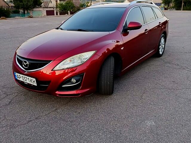 Красный Мазда 6, объемом двигателя 2 л и пробегом 229 тыс. км за 7500 $, фото 1 на Automoto.ua
