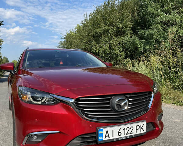Красный Мазда 6, объемом двигателя 2.2 л и пробегом 200 тыс. км за 11900 $, фото 1 на Automoto.ua