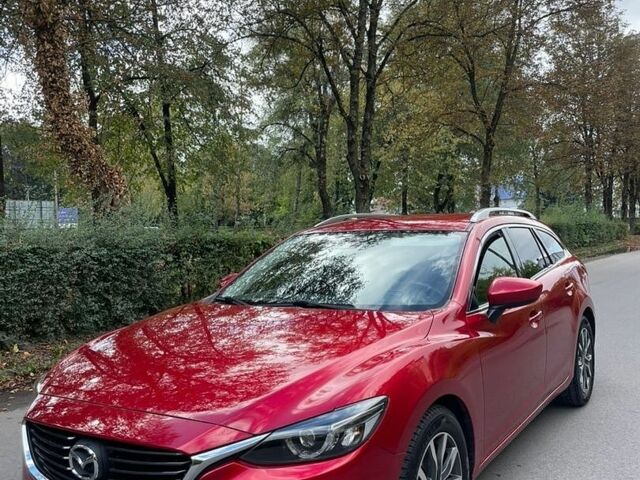 Красный Мазда 6, объемом двигателя 2.19 л и пробегом 135 тыс. км за 14500 $, фото 1 на Automoto.ua