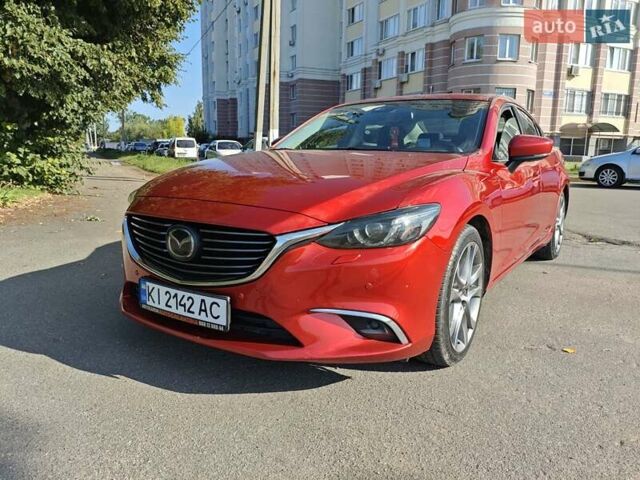 Красный Мазда 6, объемом двигателя 2.19 л и пробегом 137 тыс. км за 14500 $, фото 1 на Automoto.ua