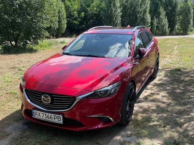 Красный Мазда 6, объемом двигателя 2.19 л и пробегом 229 тыс. км за 15500 $, фото 1 на Automoto.ua