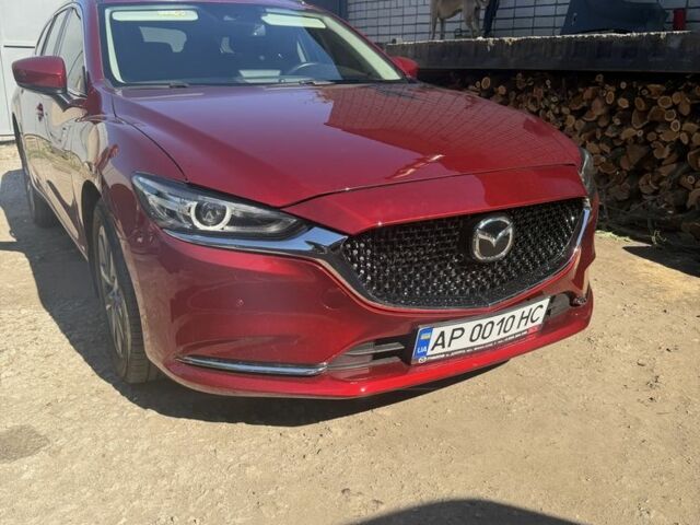 Красный Мазда 6, объемом двигателя 2 л и пробегом 129 тыс. км за 16502 $, фото 1 на Automoto.ua