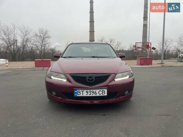 Красный Мазда 6, объемом двигателя 2 л и пробегом 220 тыс. км за 5000 $, фото 1 на Automoto.ua