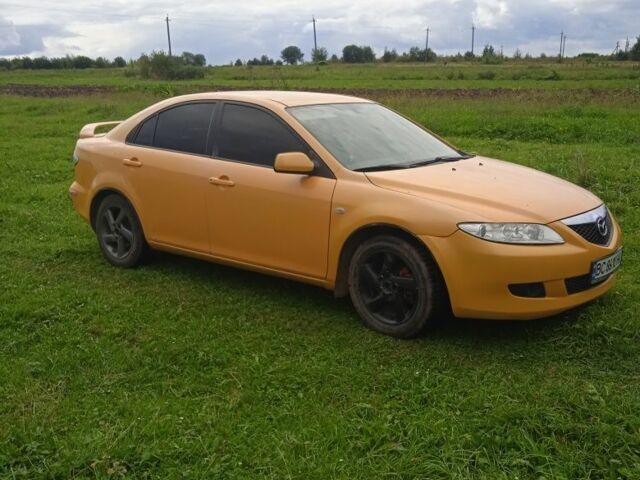 Желтый Мазда 6, объемом двигателя 2 л и пробегом 133 тыс. км за 3700 $, фото 1 на Automoto.ua