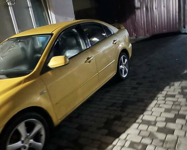 Желтый Мазда 6, объемом двигателя 2.3 л и пробегом 220 тыс. км за 4300 $, фото 1 на Automoto.ua