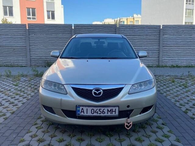 Желтый Мазда 6, объемом двигателя 1.99 л и пробегом 286 тыс. км за 3500 $, фото 1 на Automoto.ua