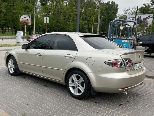 Желтый Мазда 6, объемом двигателя 2 л и пробегом 210 тыс. км за 3000 $, фото 1 на Automoto.ua