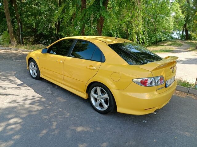 Желтый Мазда 6, объемом двигателя 2.3 л и пробегом 214 тыс. км за 4499 $, фото 1 на Automoto.ua