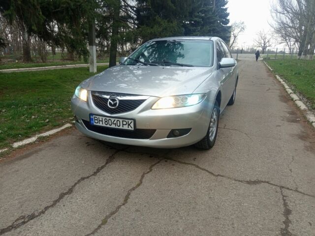 Серый Мазда 6, объемом двигателя 2 л и пробегом 259 тыс. км за 3500 $, фото 1 на Automoto.ua