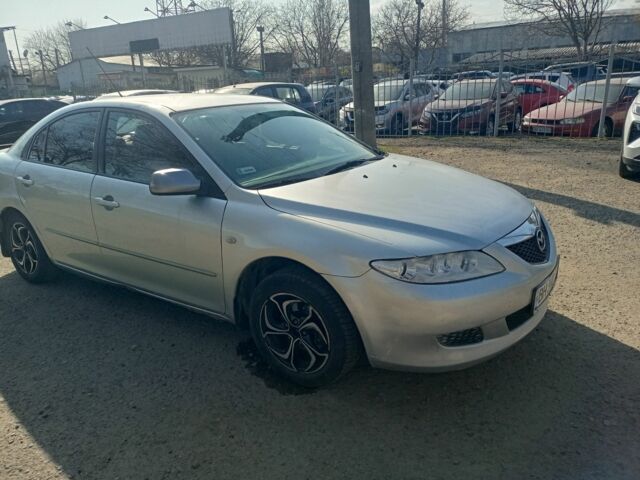 Серый Мазда 6, объемом двигателя 1.8 л и пробегом 345 тыс. км за 2750 $, фото 1 на Automoto.ua