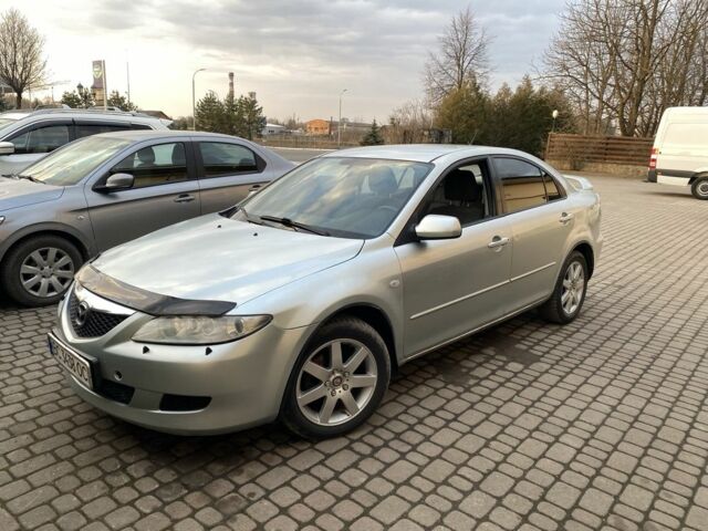 Серый Мазда 6, объемом двигателя 2 л и пробегом 300 тыс. км за 2350 $, фото 1 на Automoto.ua