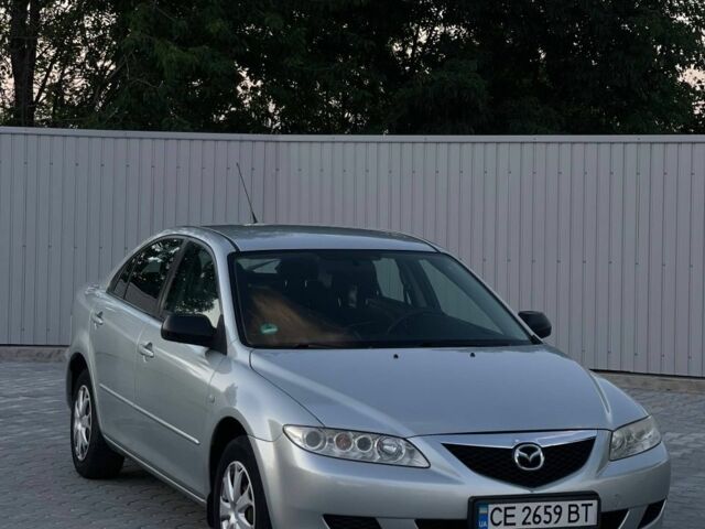 Серый Мазда 6, объемом двигателя 2 л и пробегом 264 тыс. км за 3374 $, фото 1 на Automoto.ua