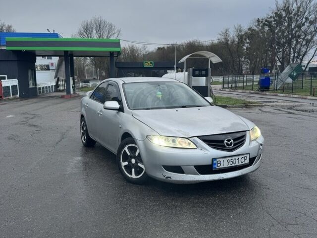 Сірий Мазда 6, об'ємом двигуна 2.3 л та пробігом 520 тис. км за 2934 $, фото 1 на Automoto.ua