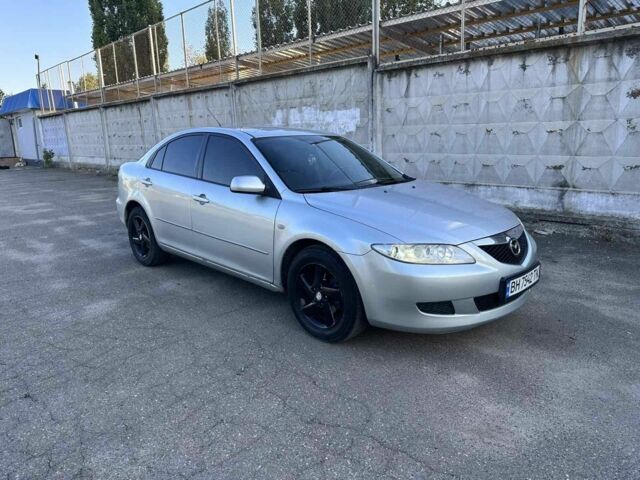 Сірий Мазда 6, об'ємом двигуна 2 л та пробігом 295 тис. км за 2999 $, фото 1 на Automoto.ua