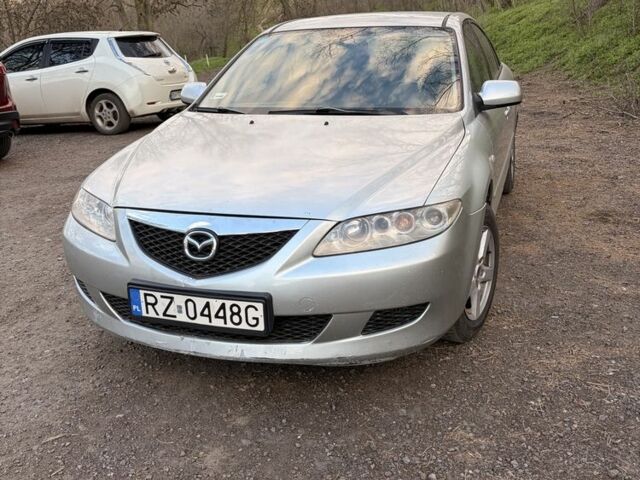 Серый Мазда 6, объемом двигателя 2 л и пробегом 300 тыс. км за 1900 $, фото 1 на Automoto.ua