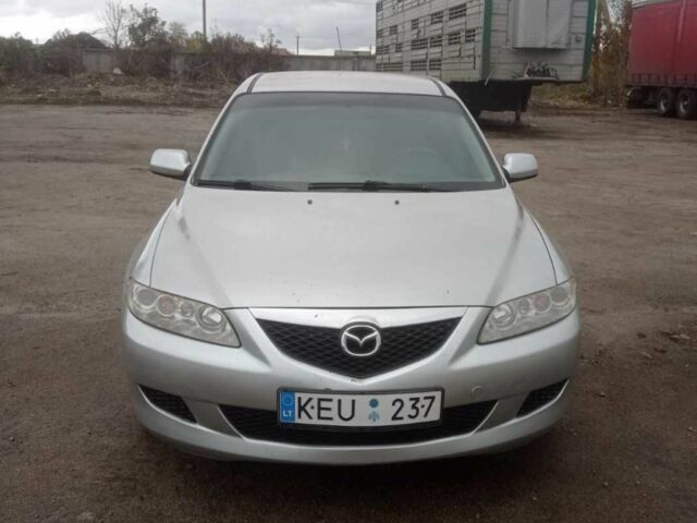 Серый Мазда 6, объемом двигателя 2 л и пробегом 300 тыс. км за 3100 $, фото 1 на Automoto.ua
