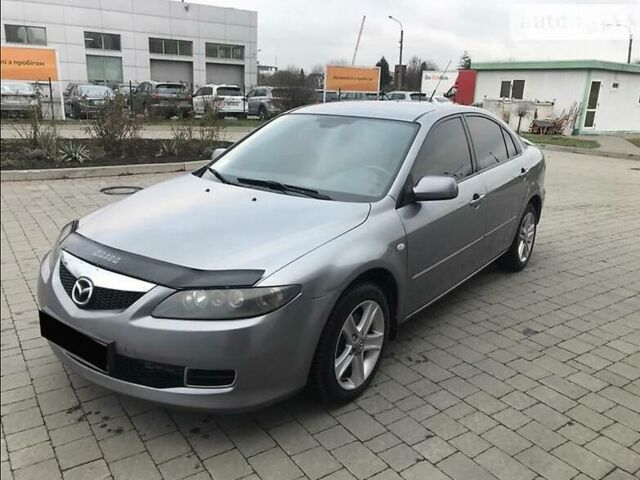 Серый Мазда 6, объемом двигателя 2 л и пробегом 192 тыс. км за 6300 $, фото 1 на Automoto.ua