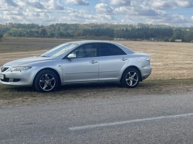 Серый Мазда 6, объемом двигателя 2 л и пробегом 327 тыс. км за 4200 $, фото 1 на Automoto.ua