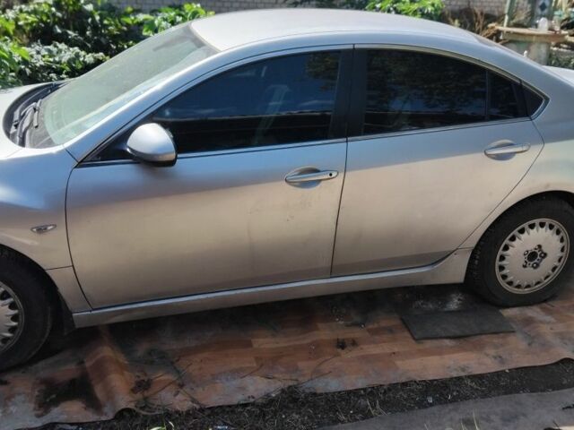 Серый Мазда 6, объемом двигателя 2 л и пробегом 568 тыс. км за 5500 $, фото 1 на Automoto.ua