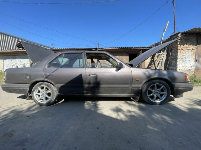 Серый Мазда 6, объемом двигателя 3 л и пробегом 495 тыс. км за 2000 $, фото 1 на Automoto.ua