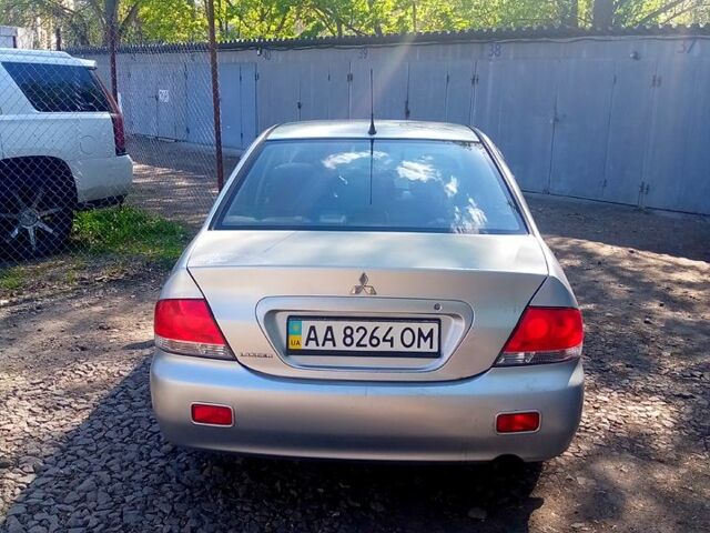 Серый Мазда 6, объемом двигателя 1.8 л и пробегом 366 тыс. км за 3800 $, фото 1 на Automoto.ua