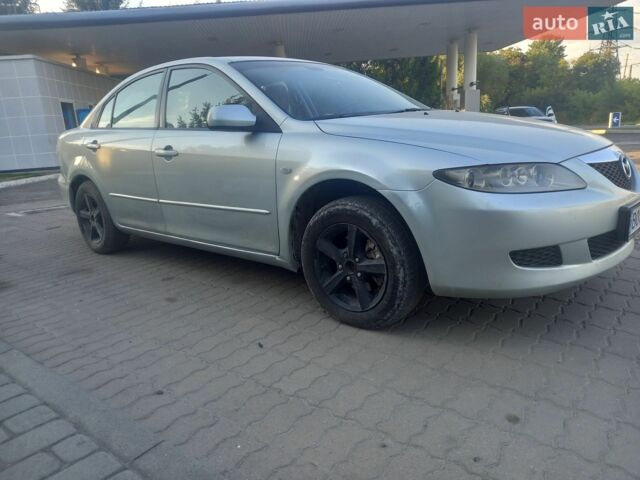 Серый Мазда 6, объемом двигателя 2 л и пробегом 300 тыс. км за 2750 $, фото 1 на Automoto.ua